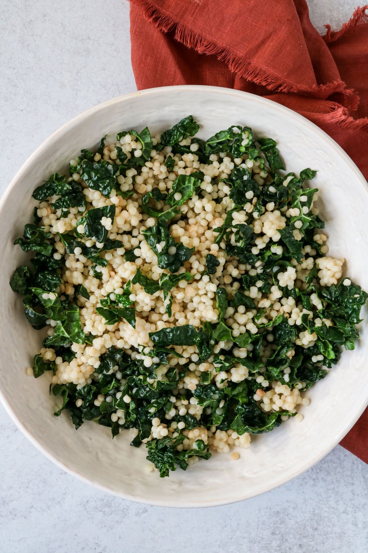 couscous salad with kale, sweet potato and pomegranate