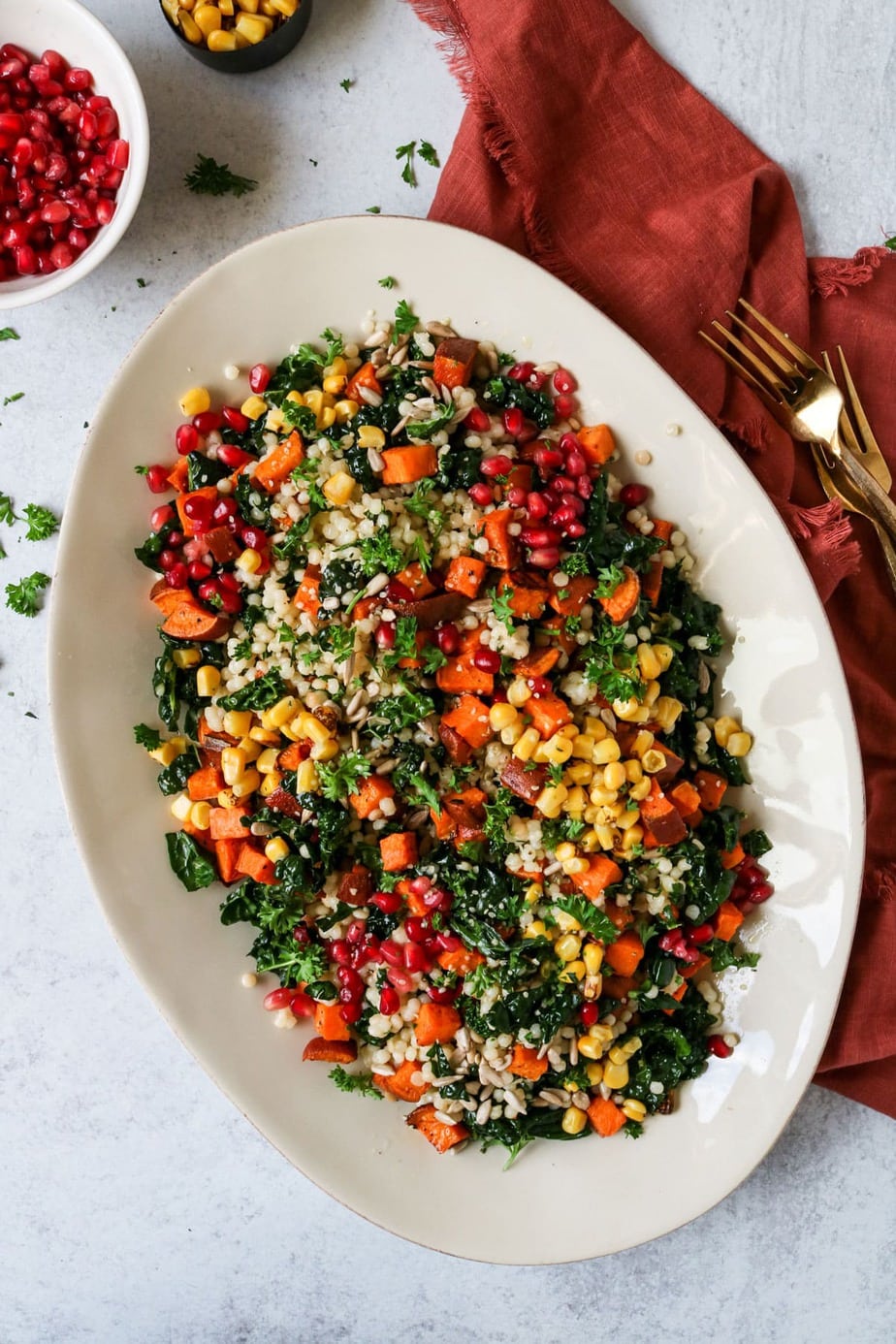 couscous salad with kale, sweet potato and pomegranate